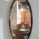Luxurious full-length mirror hanging on the living room wall