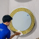 Round decorative wall art mirror with gold rim