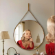 Round mirror with leather strap