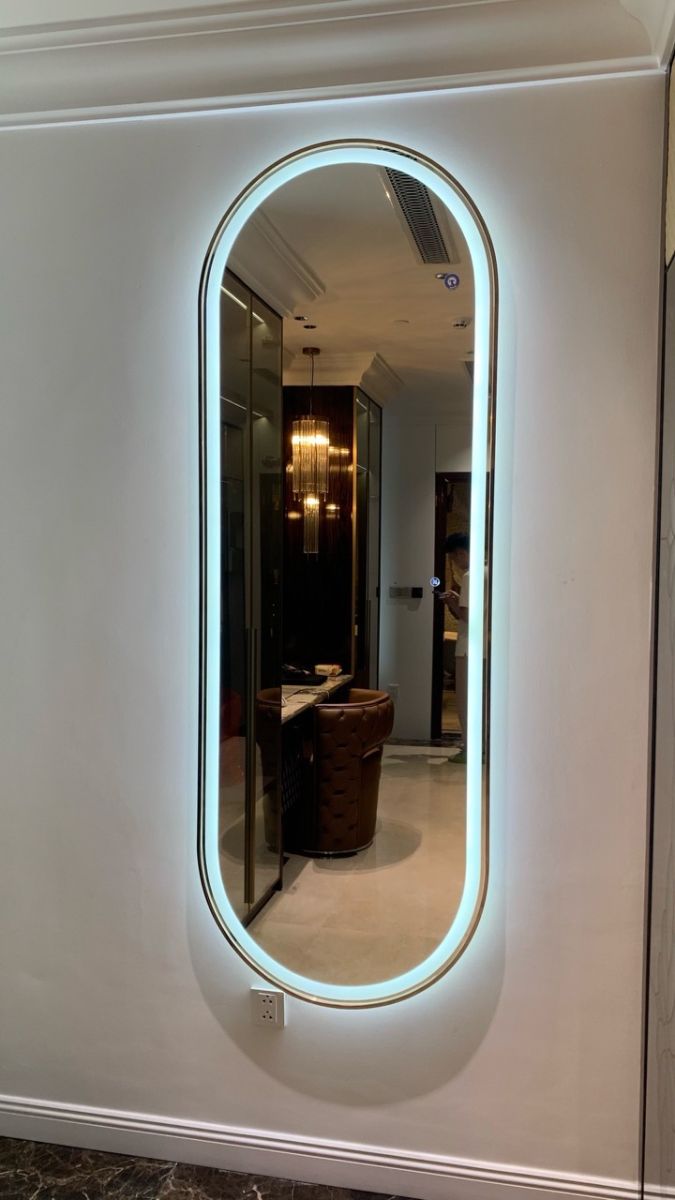 Wall-mounted full-length mirror with LED lights and gold metal frame